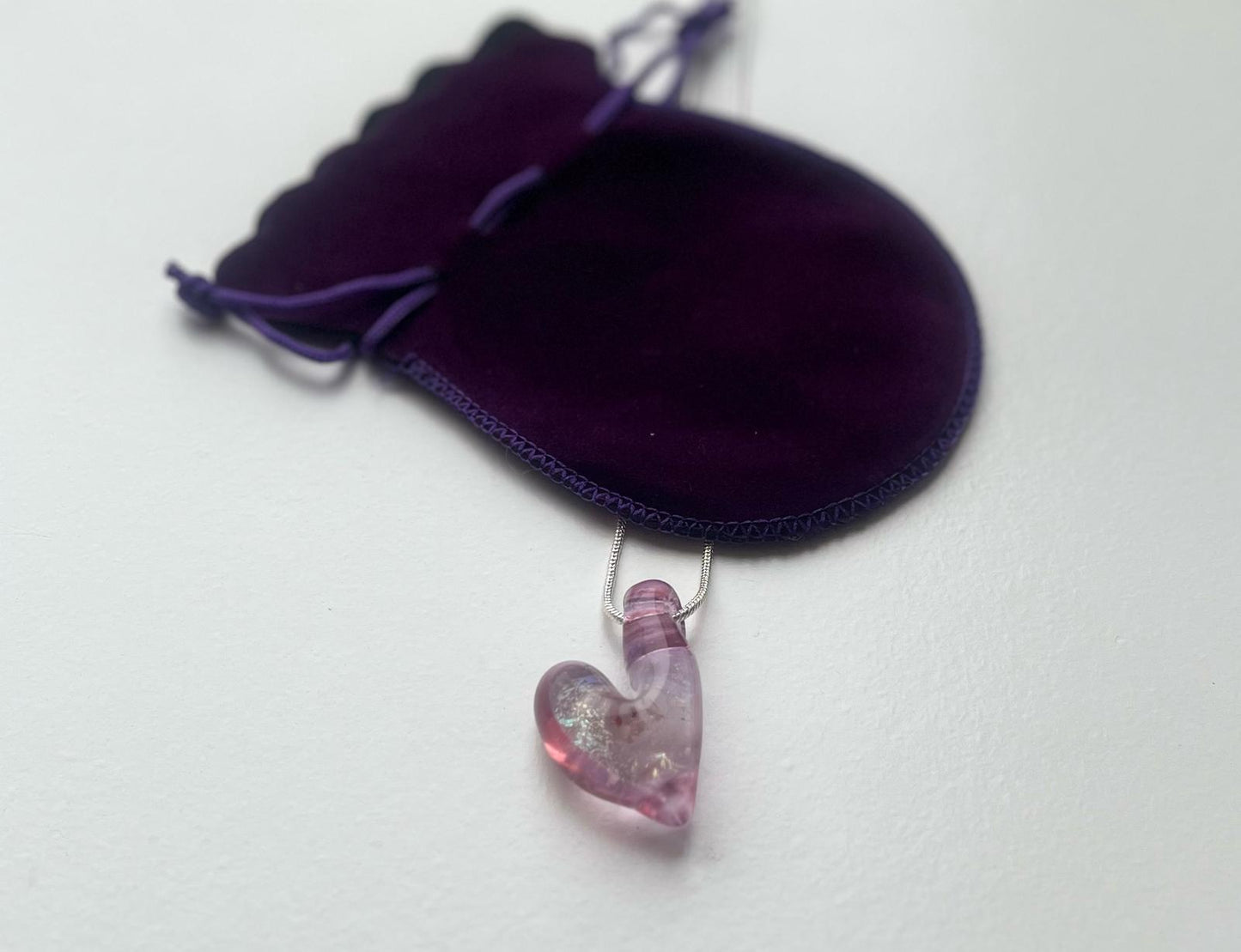 Pink vortex heart pendant