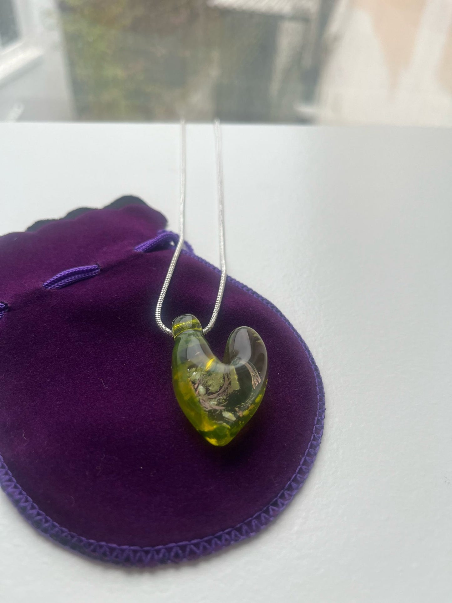 Green vortex heart pendant