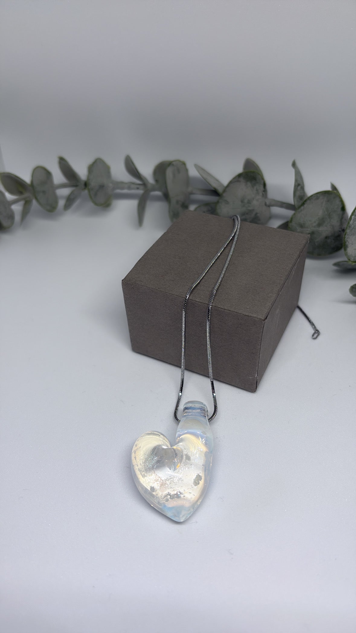White vortex heart pendant