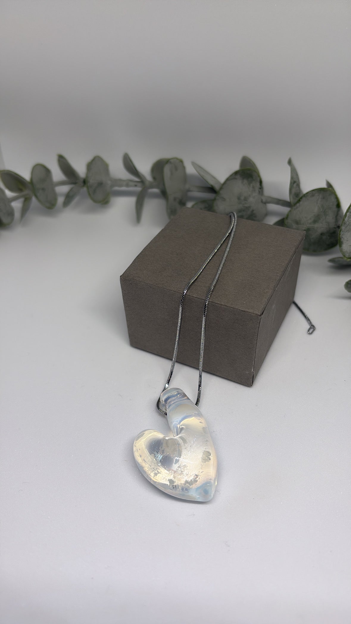 White vortex heart pendant