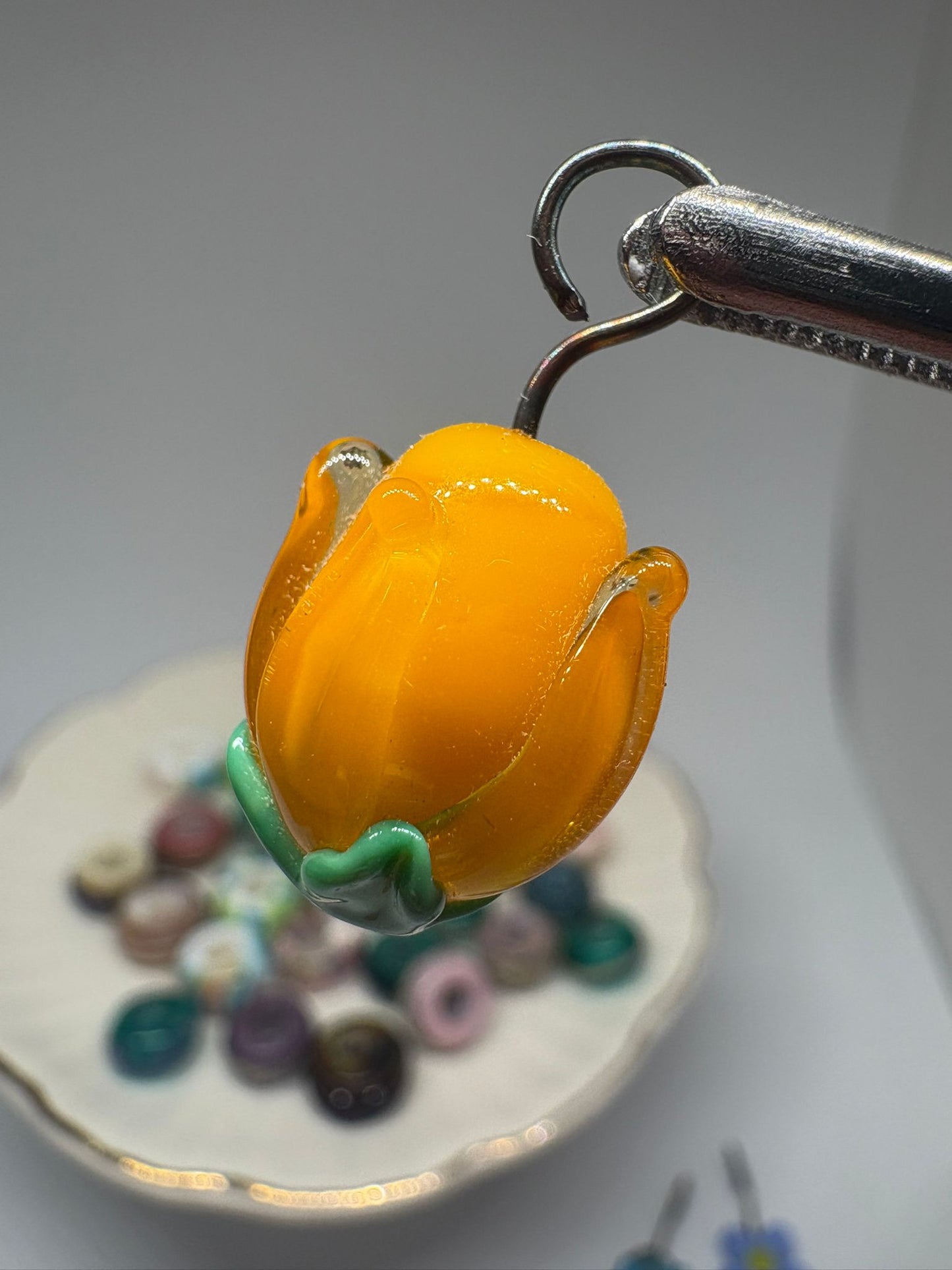 Orange flower charm