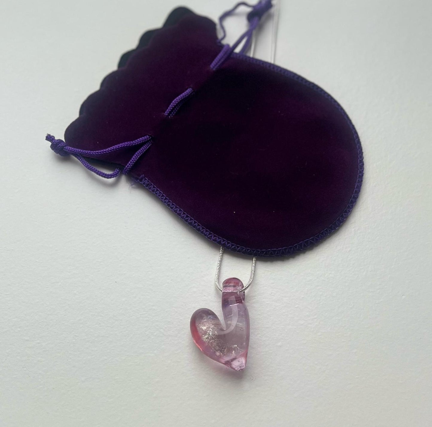 Pink vortex heart pendant
