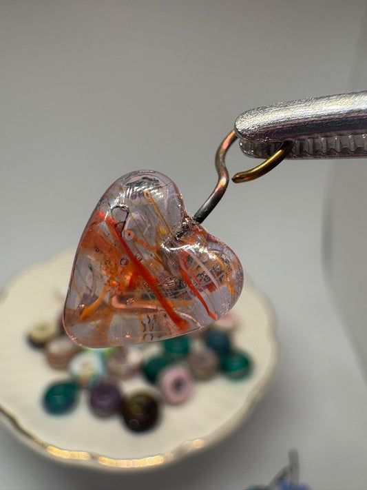 Glass heart charm