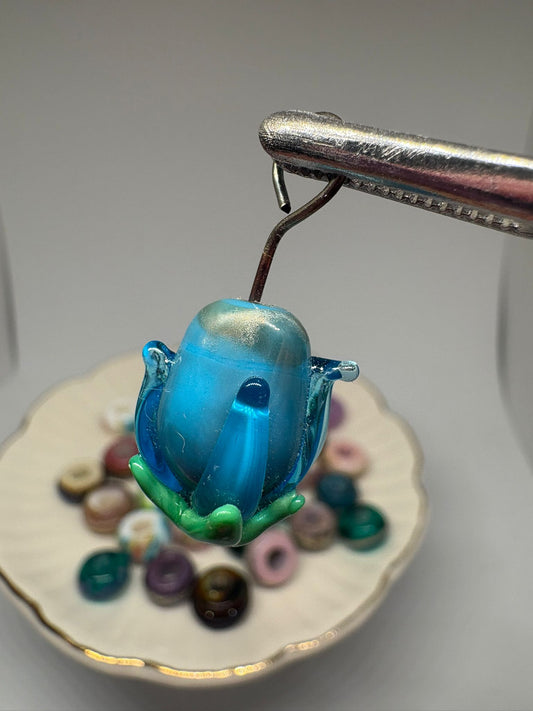 Blue glass flower charm
