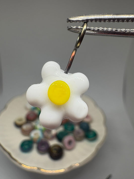 White glass daisy charm